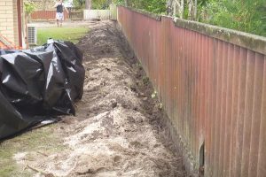 removing asbestos fence